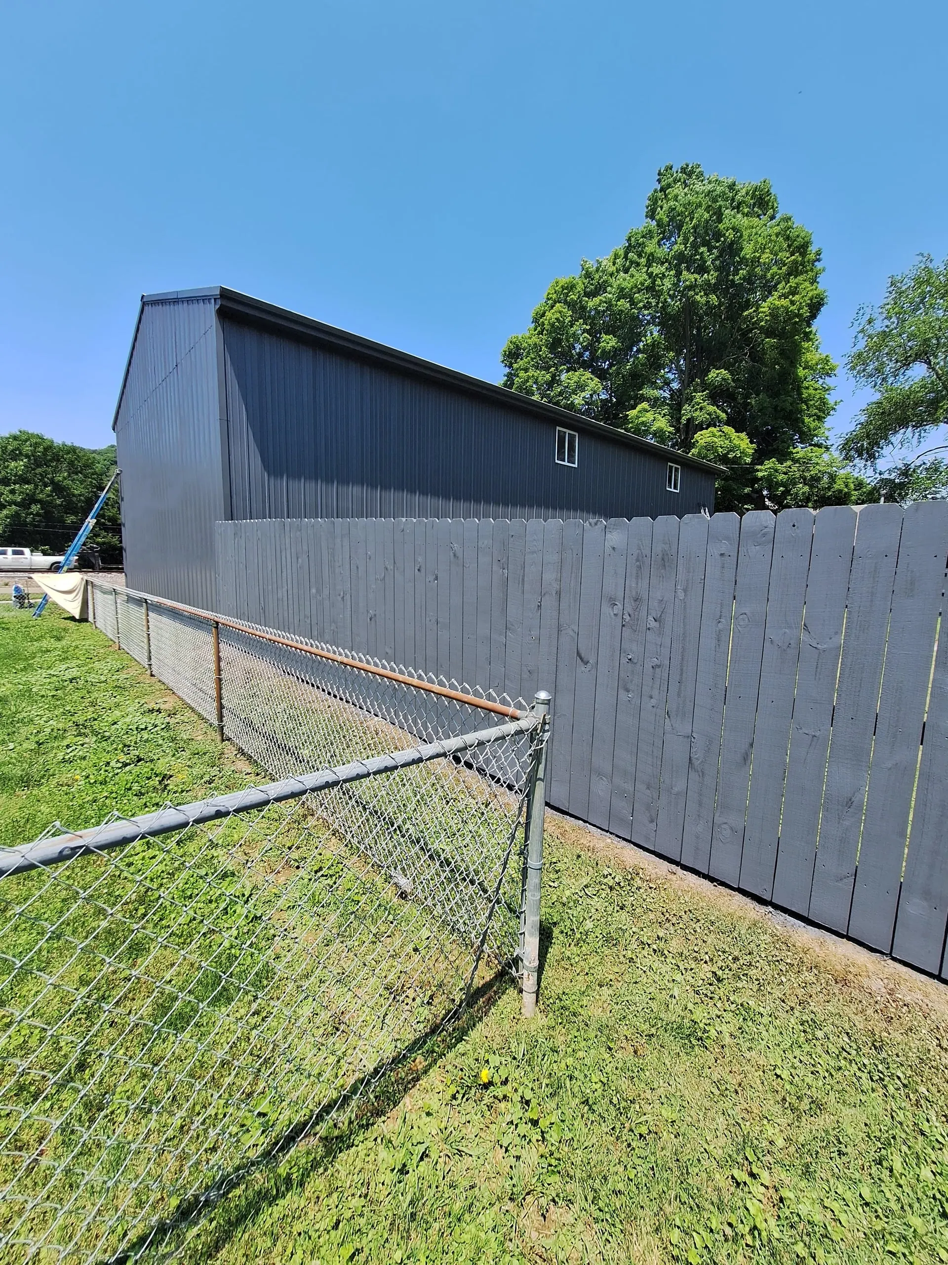 Painted fence and building exterior in Ohio