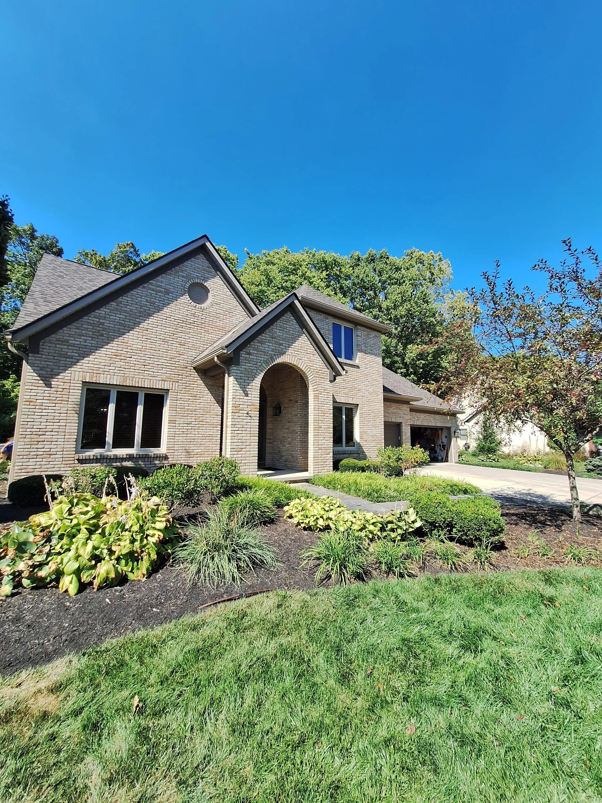 Brick home with fresh trim painting