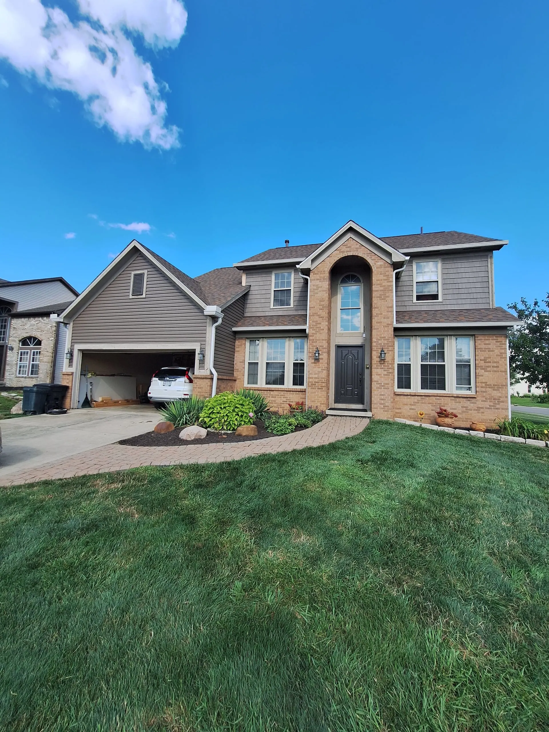 Complete house painting on two-story home
