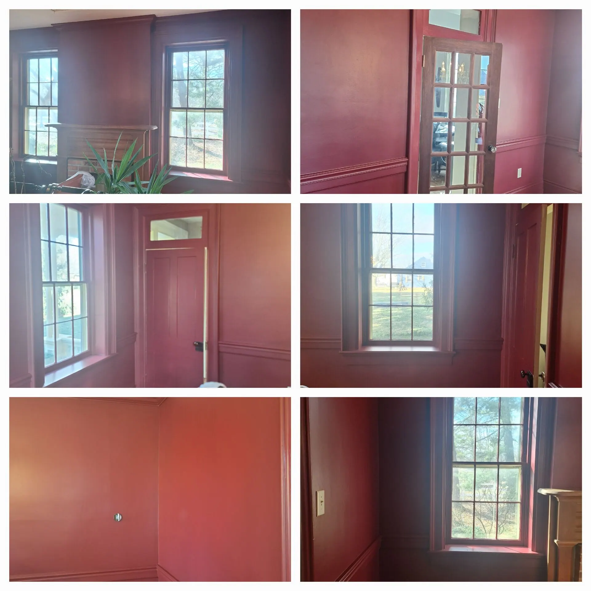 Rooms painted deep burgundy red with white window trim