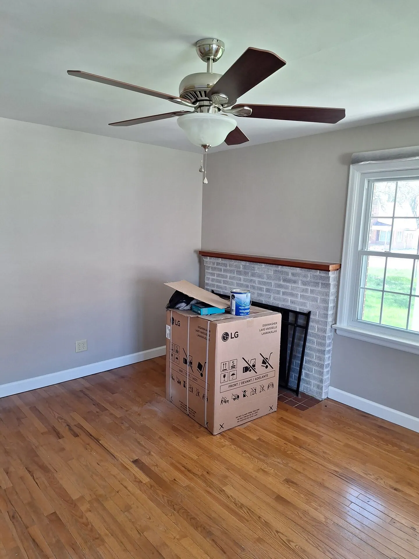 Living room with fireplace painted soft gray