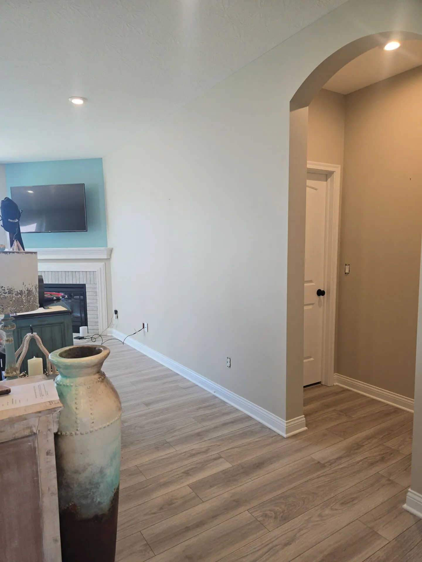 Living room and archway painted warm greige