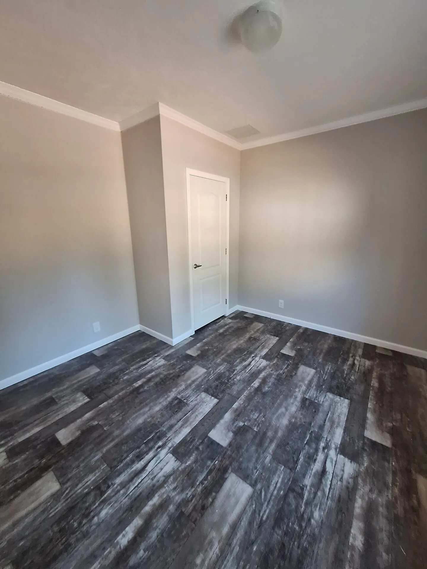 Bedroom with crown molding painted warm greige