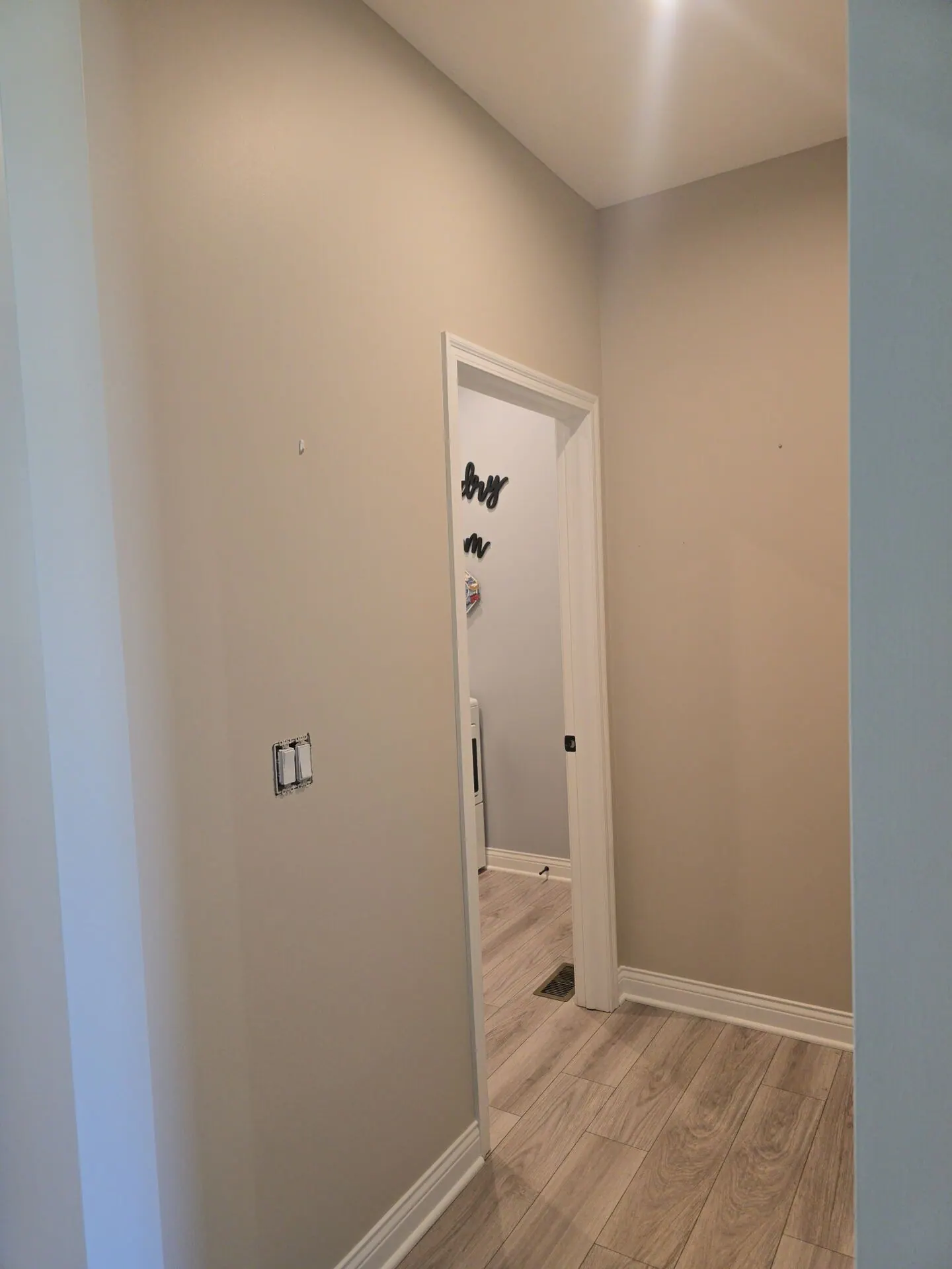 Hallway and alcove painted warm greige
