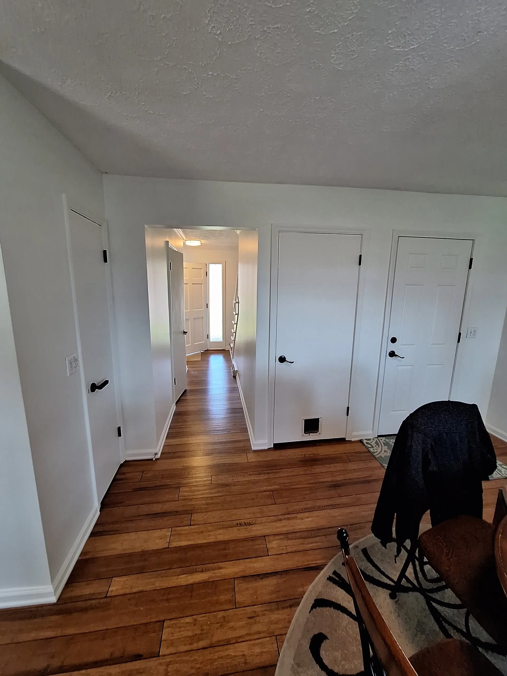 White hallway interior after professional painting
