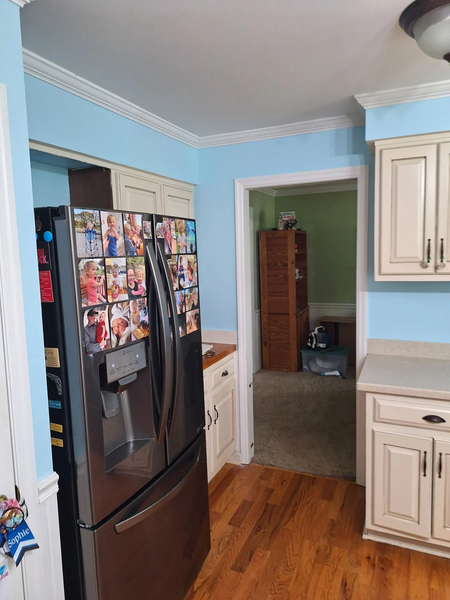 Sky blue kitchen walls with white crown molding