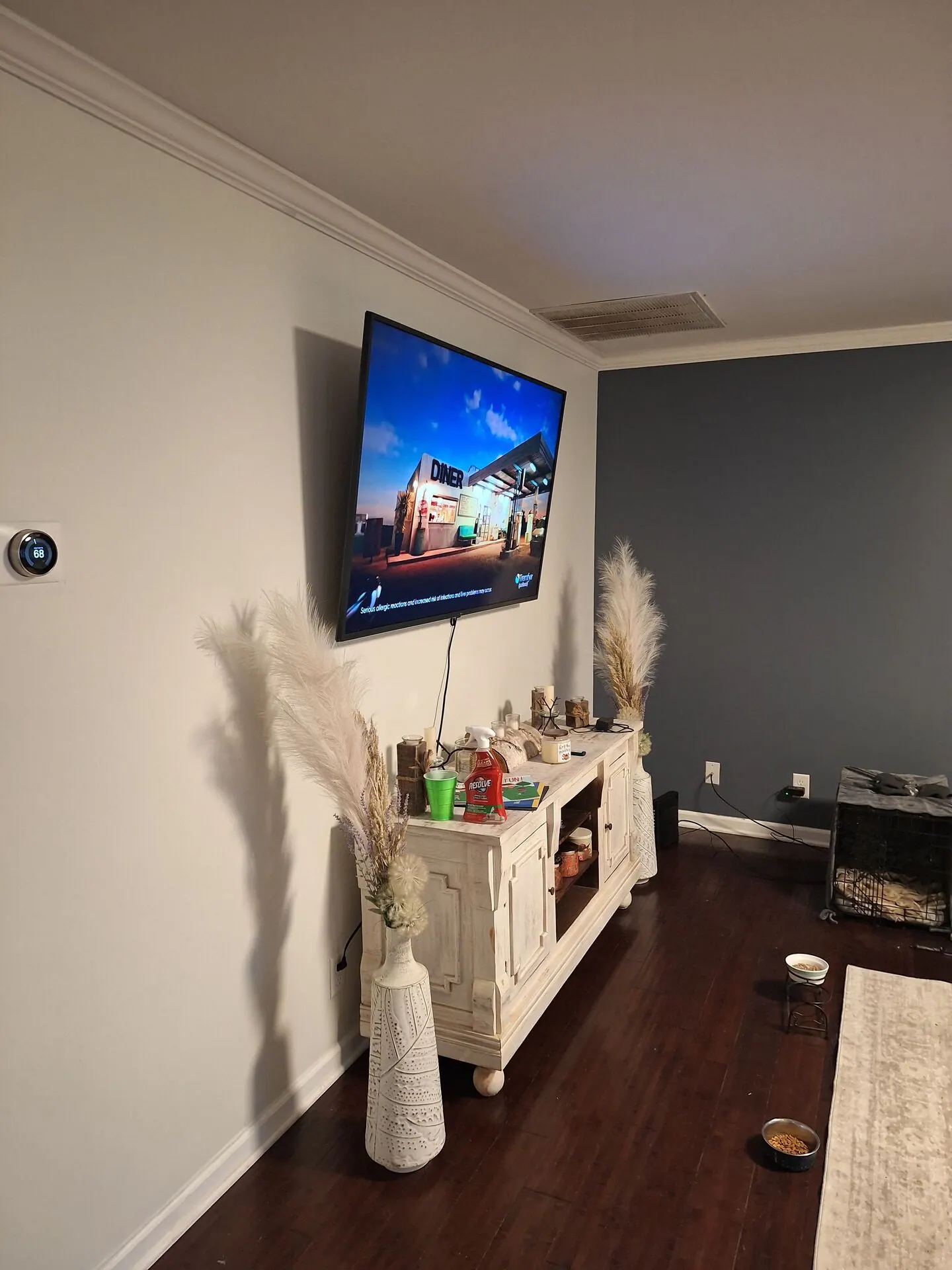 Slate blue accent wall with white walls and crown molding