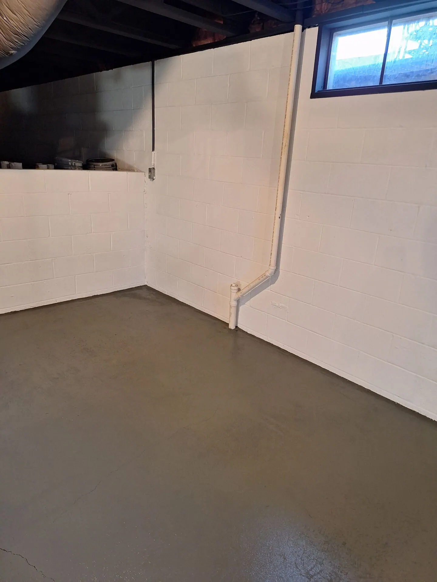 Basement walls painted bright white