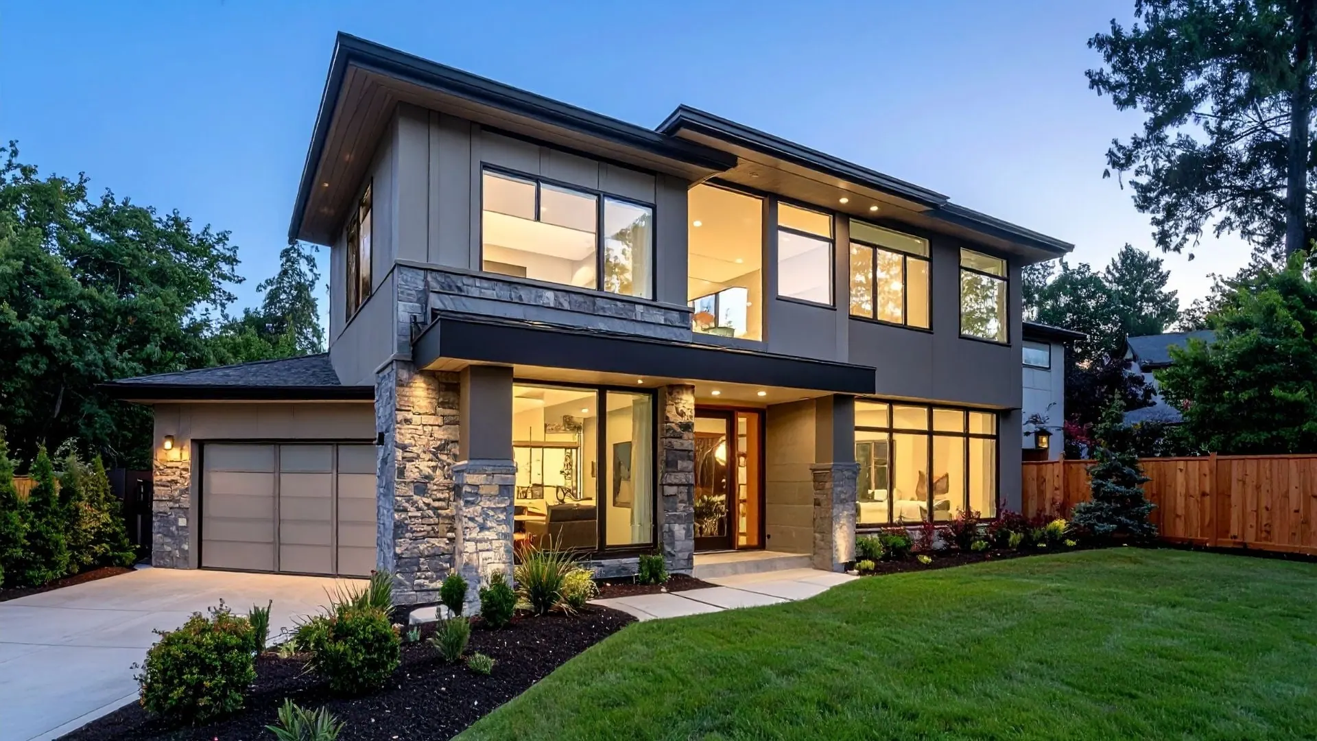 Modern home exterior at dusk — Scott's Painting and Power Washing