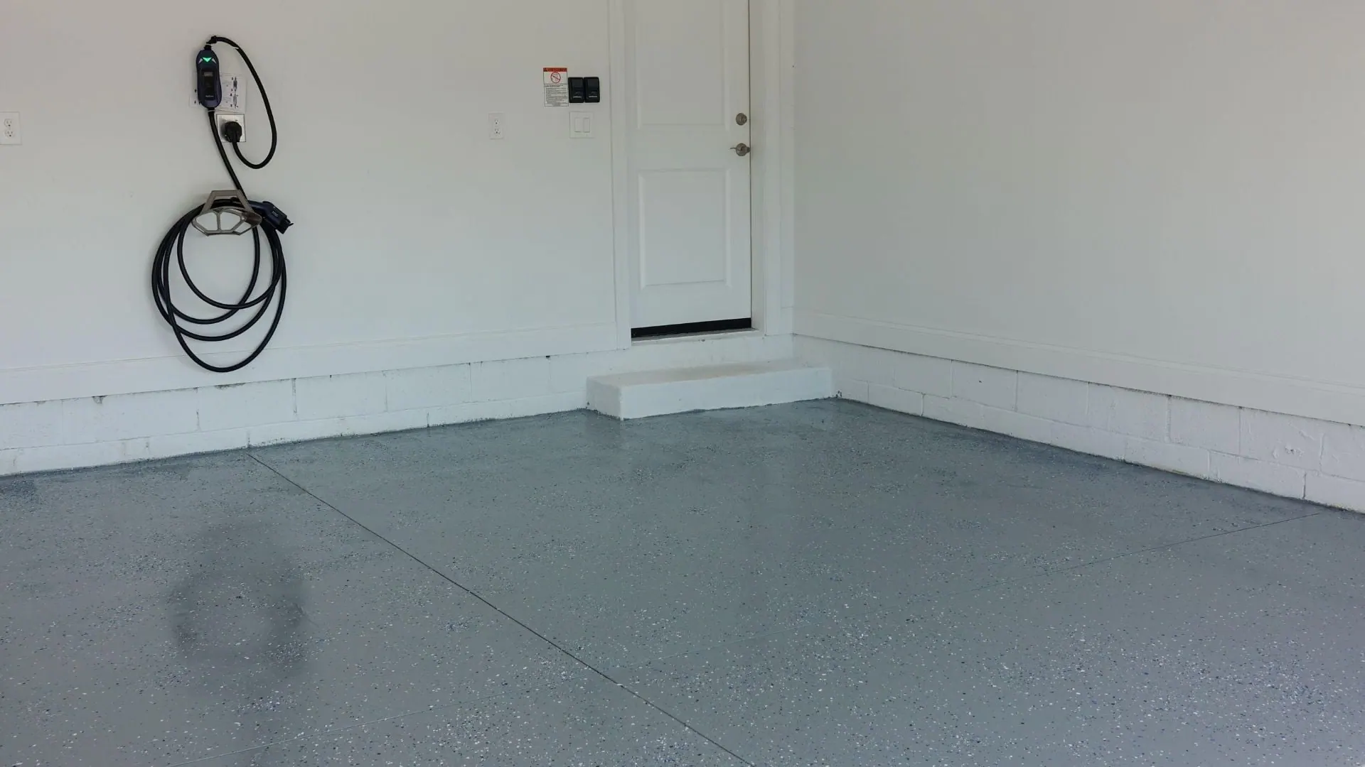 Durable epoxy floor coating in residential garage