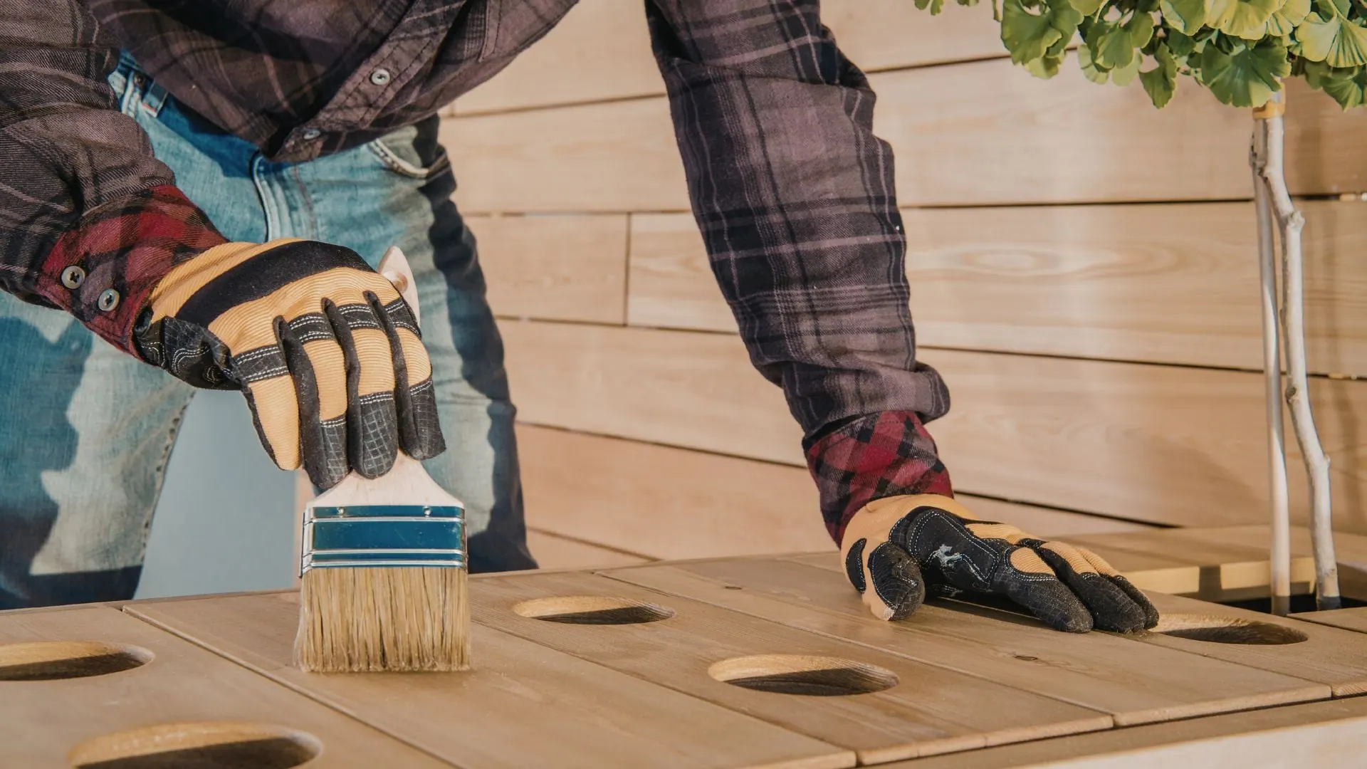 Deck staining application in progress